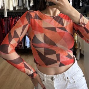 Remera crop top traslucida naranja Shein